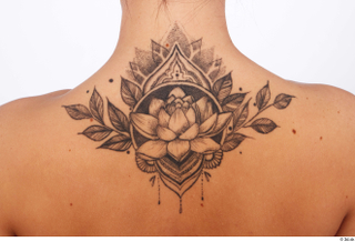 Reeta back nude skin tattoo 0001.jpg